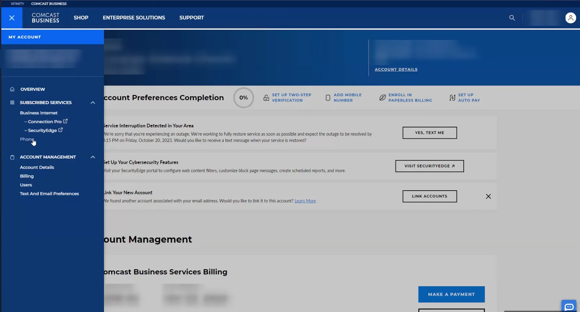 The Comcast Business My Account overview page. A service interruption notice offers a text message when service is restored, above an account checklist for two-step verification, a mobile number, paperless billing, and auto pay. Personal account details are blurred.